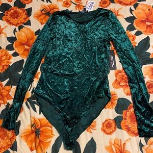 Brand new never worn green flowery bodysuit.